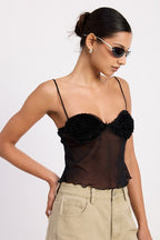 Emory Park sheer mesh floral cami top in black with spaghetti straps and floral cup detail on model