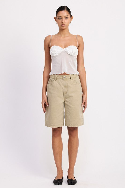 Emory Park model wearing white sheer mesh floral cami top with khaki Bermuda shorts and black flats
