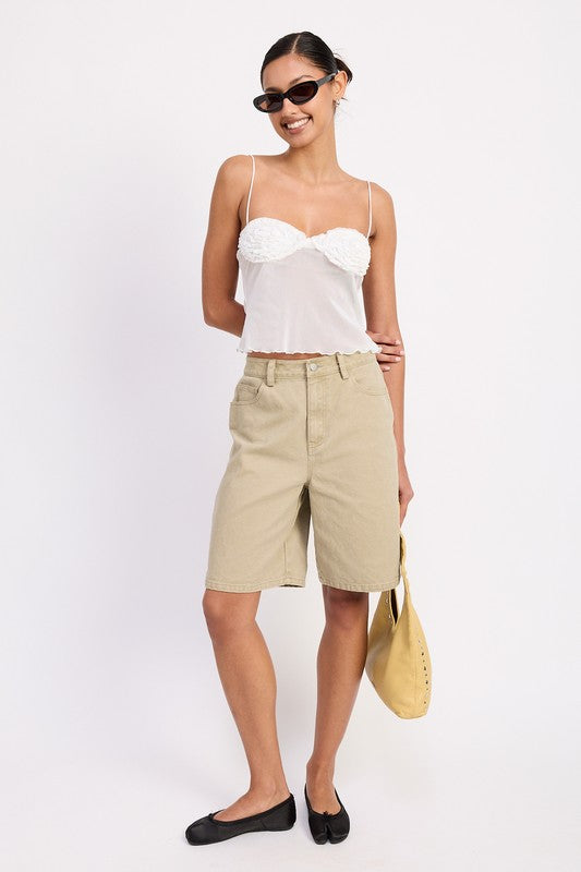 Model wearing Emory Park sheer mesh floral cami top with beige long shorts black flats and yellow tote