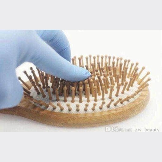 BeNat natural wooden detangling brush with ergonomic design for smooth and tangle-free hair