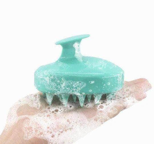 BeNat shower hair scalp scrubber in teal with soft bristles for a relaxing hair care experience