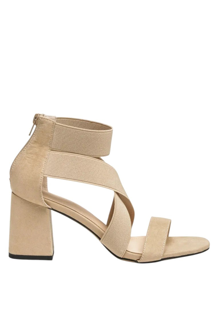 Beige sandal with block heel on a white background