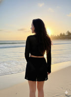 Women's black beugel bikini set, perfect for beach days.
