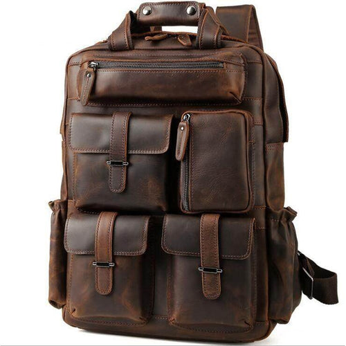 Big outdoor leather backpack with multiple pockets and sturdy design for adventures and travel