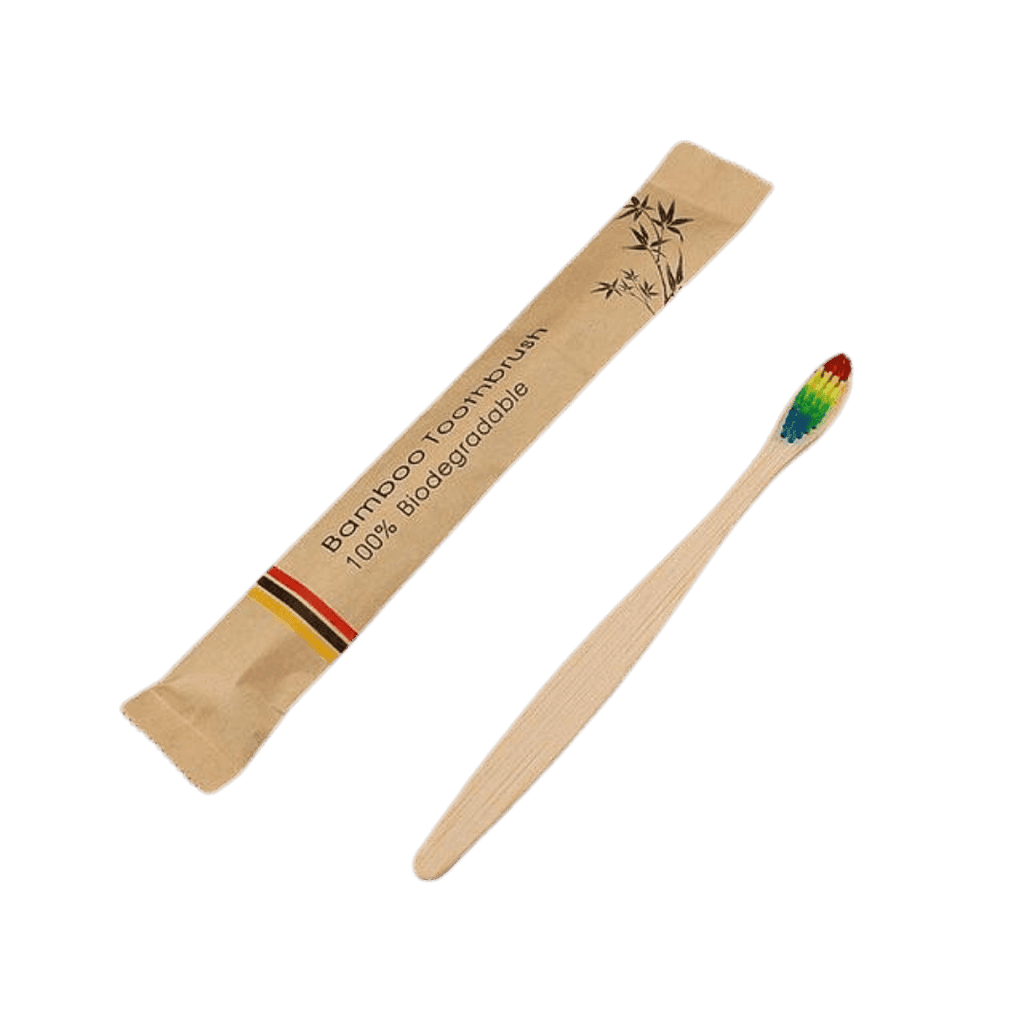 VacationGrabs biodegradable bamboo toothbrush with a colorful bristle design in eco-friendly packaging