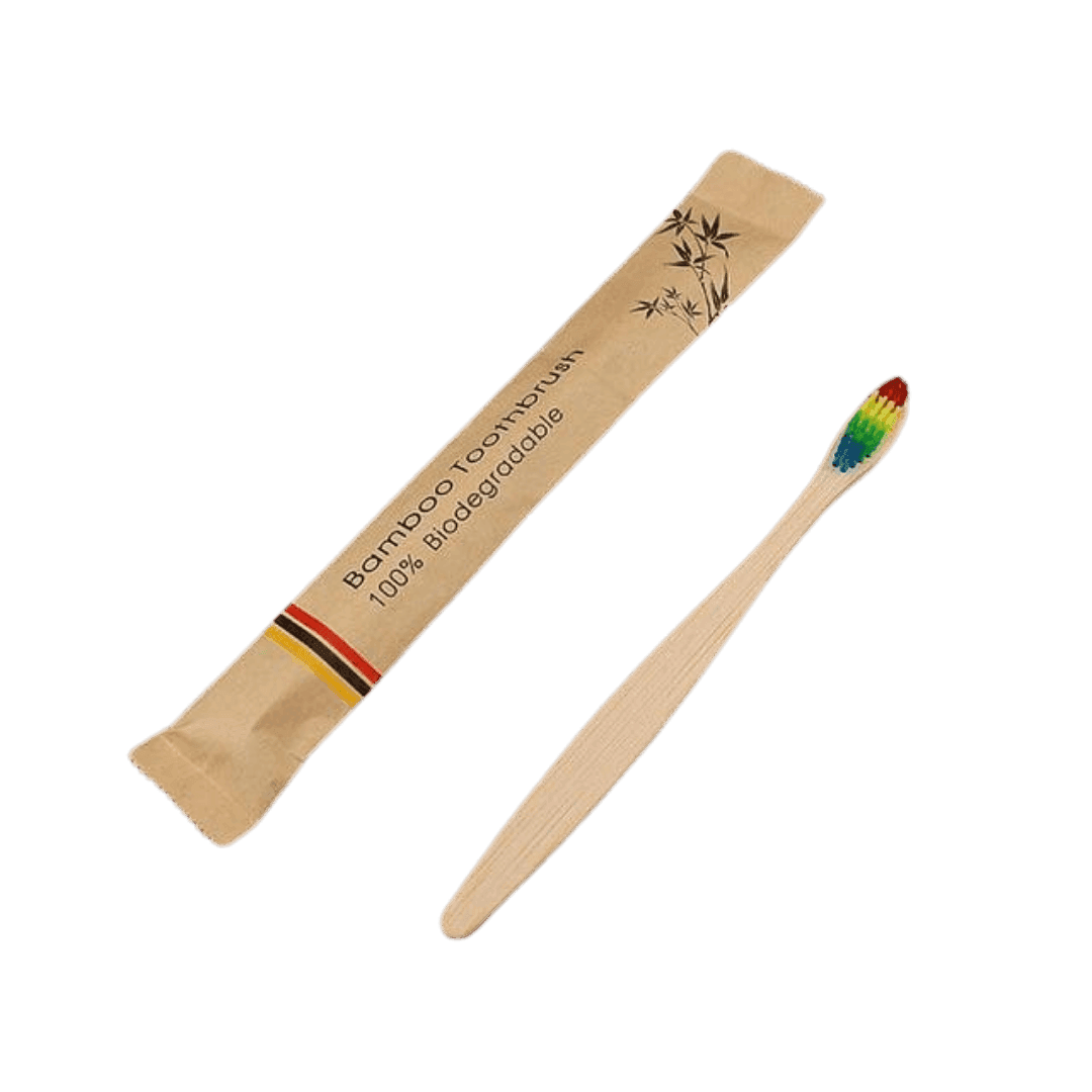 VacationGrabs biodegradable bamboo toothbrush with a colorful bristle design in eco-friendly packaging