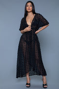 Women's black sheer cover-up, polka dot design, and maxi dress