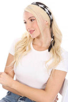 Bella Chic black and white silk scarf styled elegantly on a woman with blonde hair and a casual top