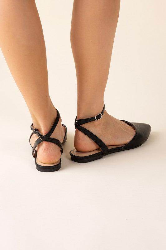 Fortune Dynamic black ankle strap flats featuring a sleek design and comfortable fit