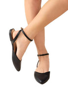 Fortune Dynamic black ankle strap flats featuring a sleek design and comfortable fit for everyday wear