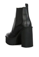Stylish black block heel ankle boots in smooth material with a trendy design and durable sole