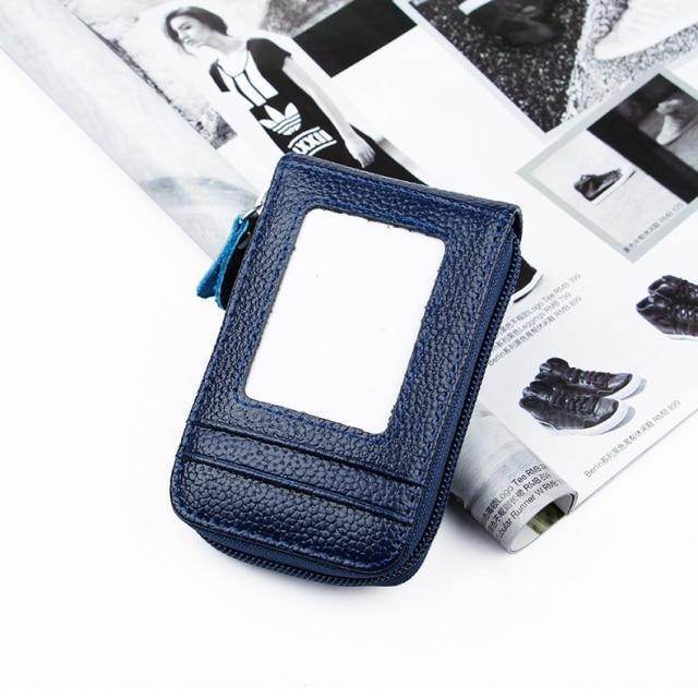 Navy blue leather wallet with zip closure and card window for easy access