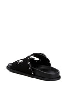 Stylish black buckle sandals with unique design and comfortable sole for casual wear