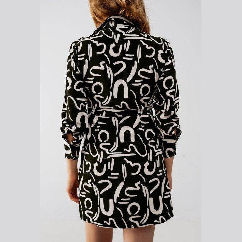 Stylish black button front shirt dress with unique abstract patterns perfect for casual outings