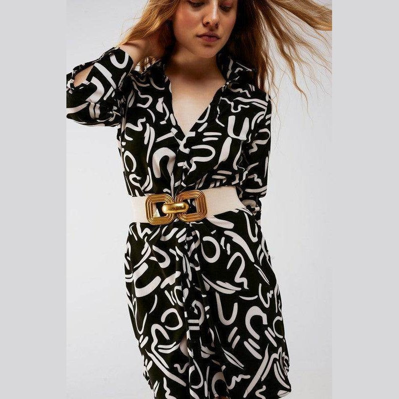 Women's black button front shirt dress with unique white abstract pattern and stylish belt