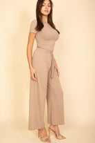 VacationGrabs women's beige casual travel outfit with short sleeves and wide-leg pants