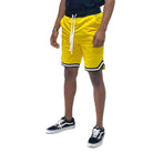 Bright yellow men's shorts featuring black chevron trim shorts for a stylish summer look