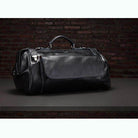 Stylish black coffee leather duffel bag with spacious compartments for travel and everyday use