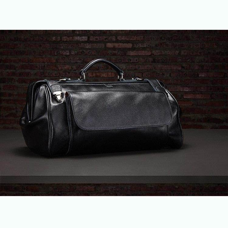 Stylish black coffee leather duffel bag with spacious compartments for travel and everyday use