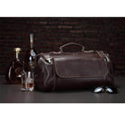 Stylish black coffee leather duffel bag with sleek design, perfect for travel or gym use