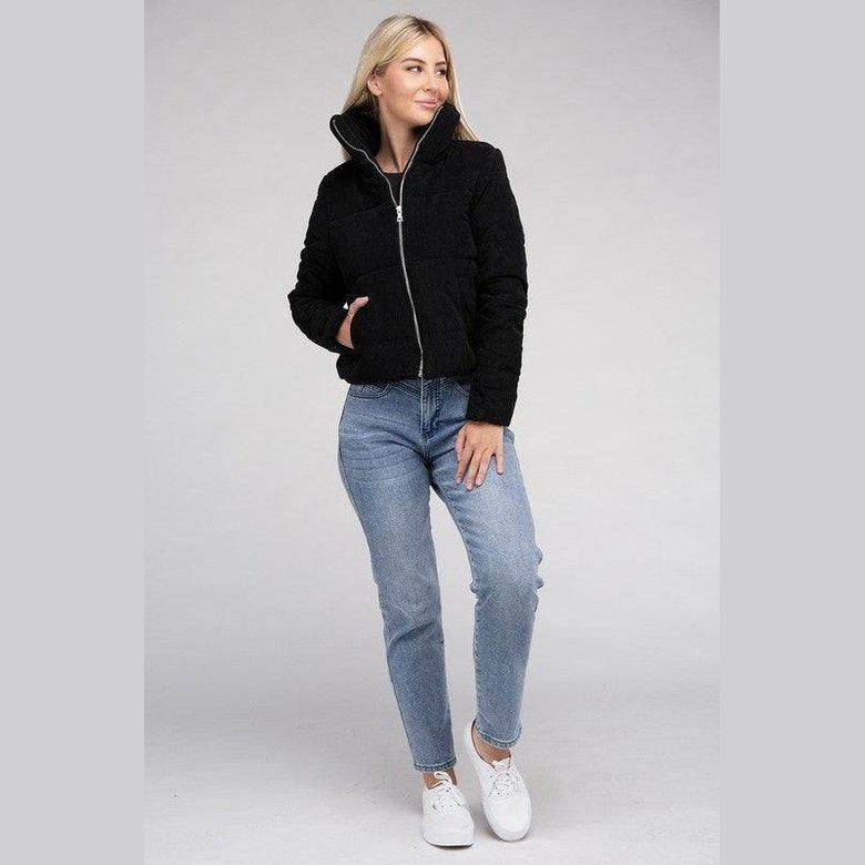 Stylish black corduroy jacket for women with zip closure and side pockets, perfect for casual outings