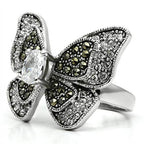 Stunning black crystal butterfly statement ring featuring intricate detailing and a central gemstone