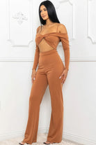 Stylish women's jumpsuit in brown with cutout design, perfect for casual and trendy looks