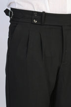 Black Double-Pleated High-Waisted Slim Fit Trousers with Side Buckles – detail view