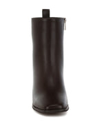Black faux leather ankle boots with a sleek design and convenient zipper closure
