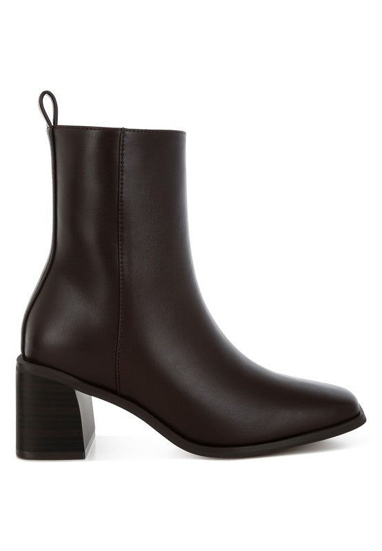 Stylish black faux leather ankle boots with a block heel for modern women's fashion