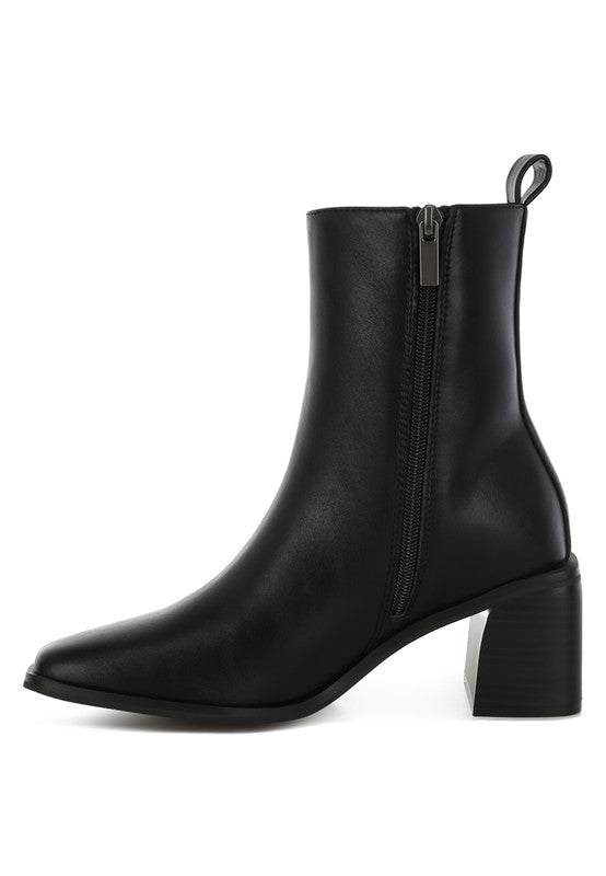 Stylish black faux leather ankle boots with a chunky heel and side zipper by Rag Company