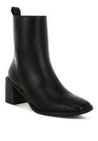 Black faux leather ankle boots with a stylish block heel for versatile outfits