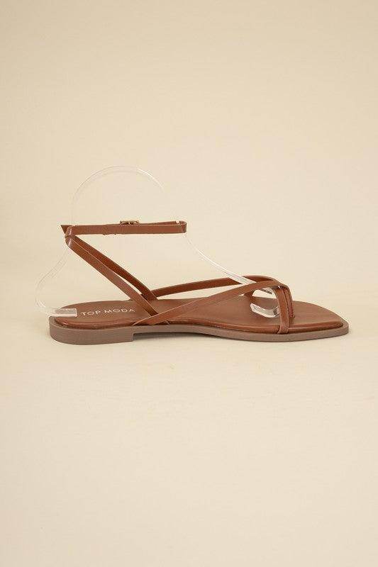 Top Guy Footwear black flat strappy sandals with minimalist design for summer style
