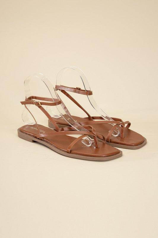 Stylish black flat strappy sandals from Top Guy Footwear with a minimalist design and comfortable fit