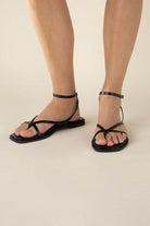 Top Guy Footwear black flat strappy sandals designed for stylish summer wear