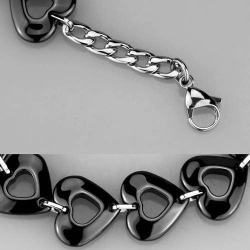 Stylish black heart link bracelet for women made of polished metal with a secure clasp
