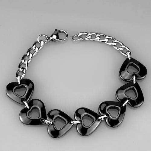 Black heart link bracelet for women featuring shiny black hearts and a silver chain for a modern look