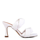 Stylish white heeled summer sandals with a twist design and a comfortable block heel