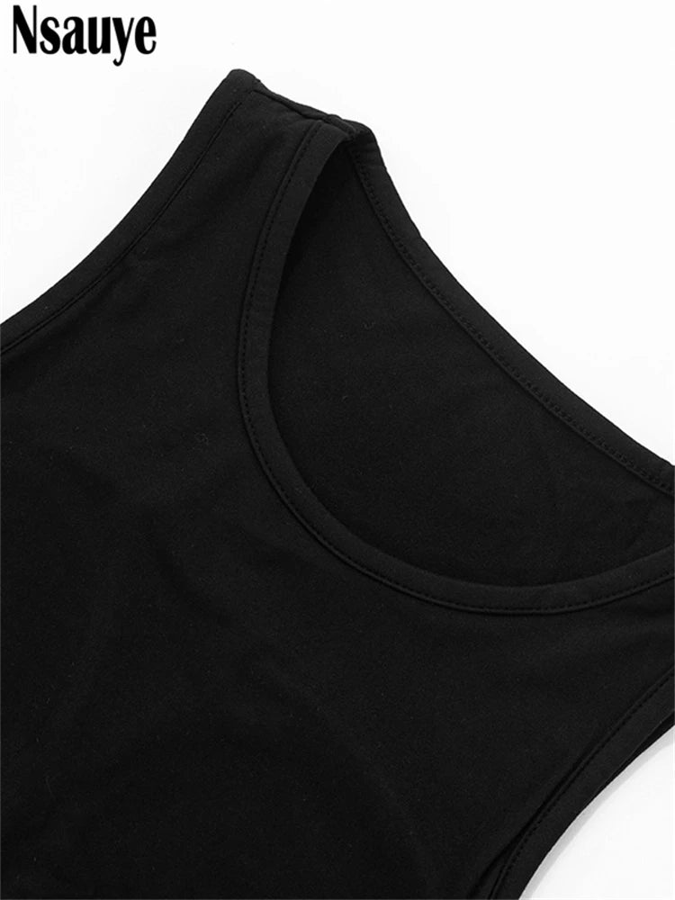 Close-up of black hollow out crop top front neckline with sleeveless design