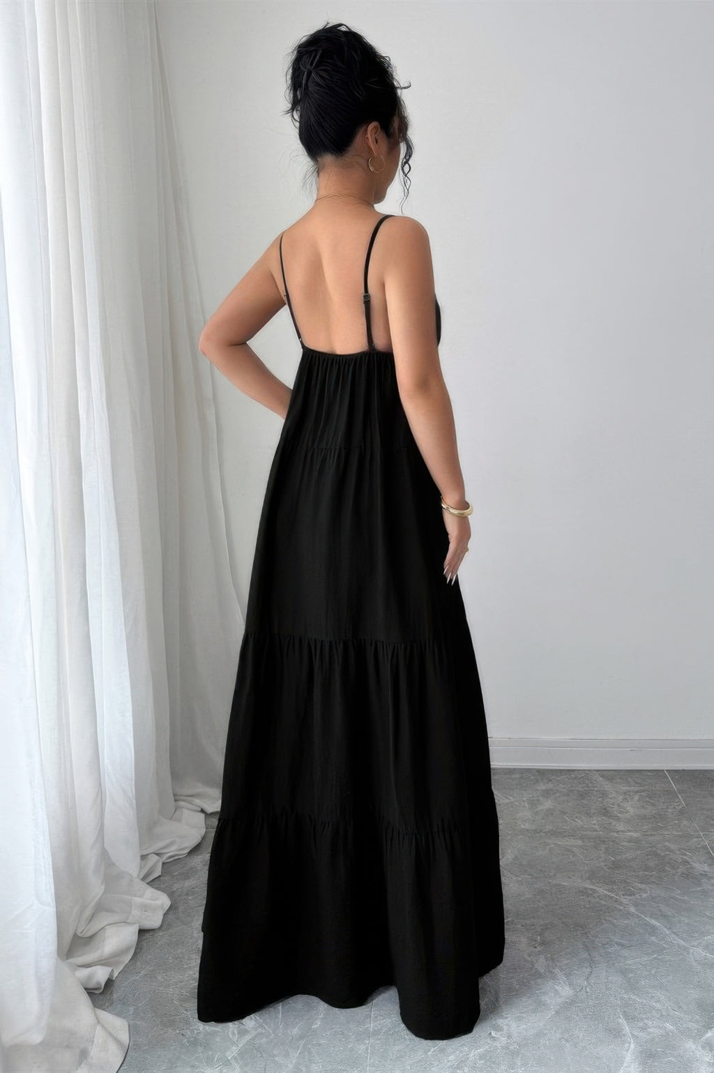 Black tiered maxi dress for women, perfect for casual outings