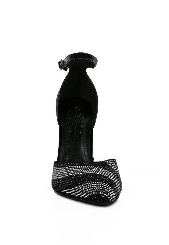 Stylish black patent evening sandals with elegant embellishments for formal occasions