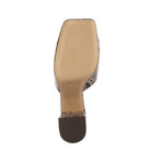Sole view of black platform sandals for women by Rag Company with textured bottom and square toe