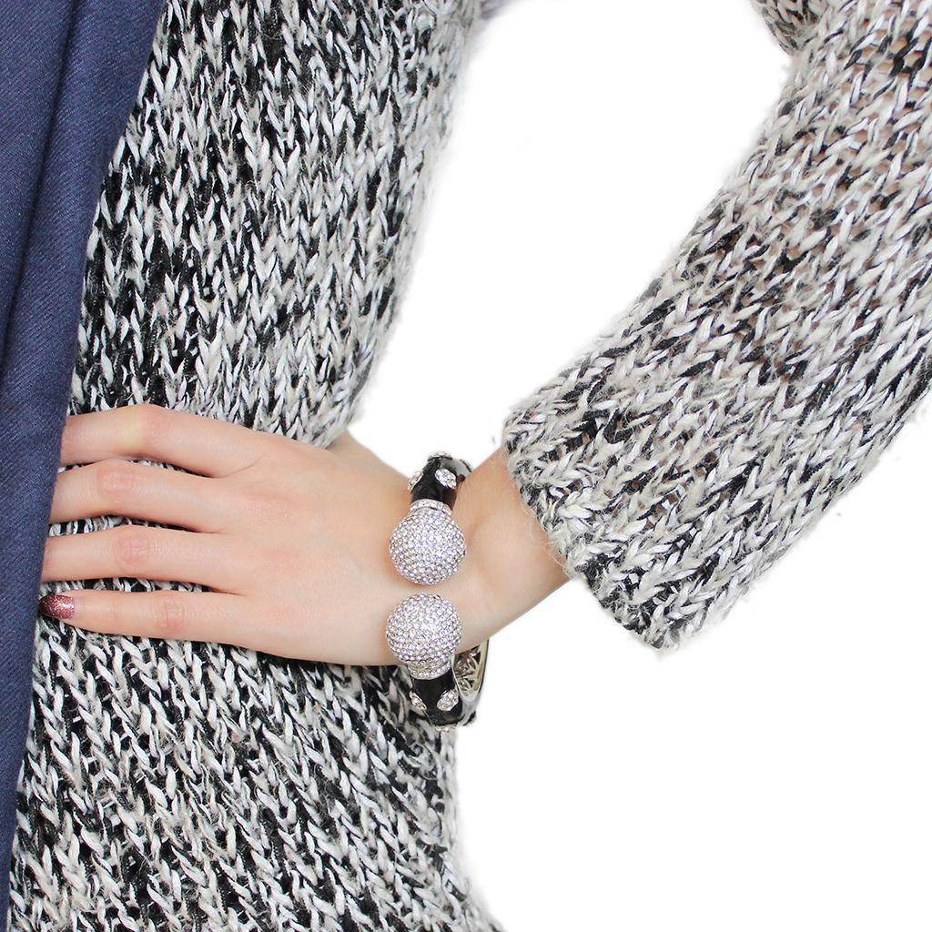 Stylish black rhodium bangle bracelet featuring sparkling bead accents for a chic look
