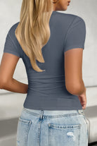 Elegant black scoop neck top for women, perfect for casual and stylish outfits.