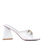 Stylish white heeled sandals for women with a unique cone heel and decorative buckle detail