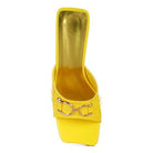 Stylish yellow slider sandals for women featuring a chic design and gold accents