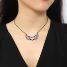 Black stainless steel necklace with angel wings and heart design, perfect for trendy women