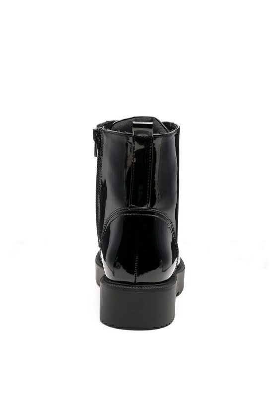 Back view of black statement combat boots from Rag Company with shiny finish and zipper details