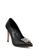Elegant black stiletto shoes by Rag Company featuring a decorative rhinestone buckle