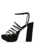 black strappy platform sandals, suede material, stylish and bold
